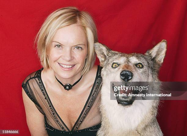 Journalist Mariella Frostrup poses in a Victorian-themed booth at the "Amnesty International - VIP Burlesque Party" at Canvas on November 25, 2004 in...