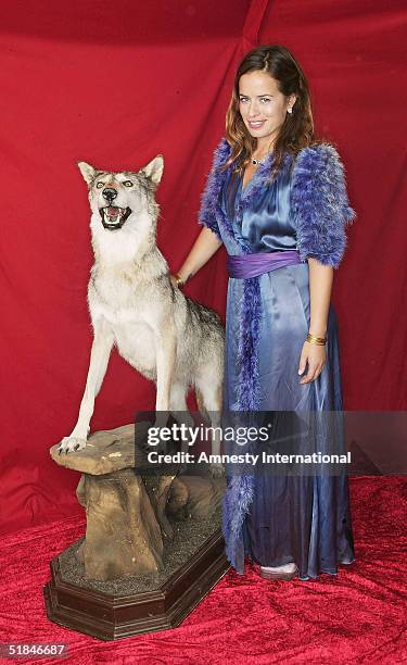 Jade Jagger poses in a Victorian-themed booth at the "Amnesty International - VIP Burlesque Party" at Canvas on November 25, 2004 in London. Thrown...