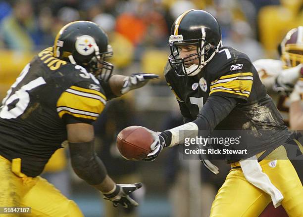 Quarterback Ben Roethlisberger of the Pittsburgh Steelers hands-off the ball to Jerome Bettis during the game against the Washington Redskins on...