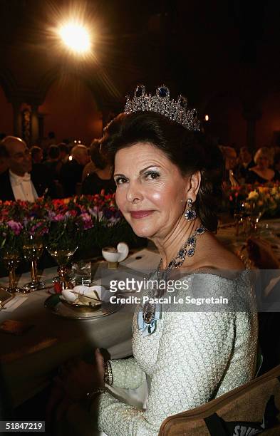 Queen Silvia of Sweden attends the Nobel Banquet at City Hall on December 10, 2004 in Stockholm, Sweden. The prizes were being awarded at...