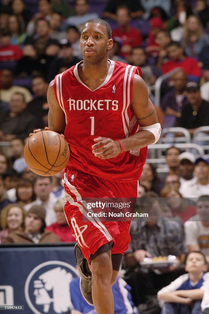 T Mac Rockets Tracy McGrady of the Houston Rockets brings the ball upcourt during ...