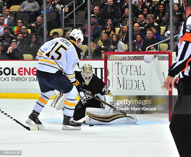 Matt Murray of the Pittsburgh Penguins makes a save on a shot by Jack Eichel of the Buffalo Sabres at Consol Energy Center on March 29, 2016 in...