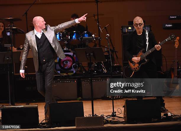 Glenn Gregory, Woody Woodmansey and Tony Visconti of Holy Holy perform onstage at Michael Dorf Presents - The Music of David Bowie at Carnegie Hall...