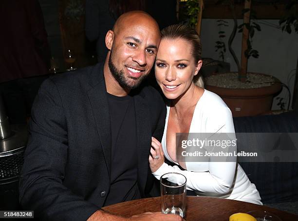 Former professional football player Hank Baskett and TV personality Kendra Wilkinson attend WE tv's premiere of "Kendra On Top" and "Driven To Love"...