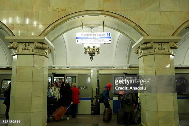 Passengers are seen getting into train at the Komsomolskaya Metro Station in Moscow, Russia on April 01, 2016. The Moscow Metro was one of USSRs most...