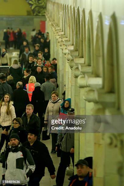 Passengers are seen at the Komsomolskaya Metro Station in Moscow, Russia on April 01, 2016. The Moscow Metro was one of USSRs most ambitious...