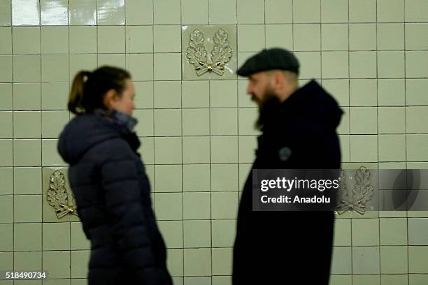 Passengers are seen chatting with each other at the Belaruskaya Metro Station in Moscow, Russia on April 01, 2016. The Moscow Metro was one of USSRs...