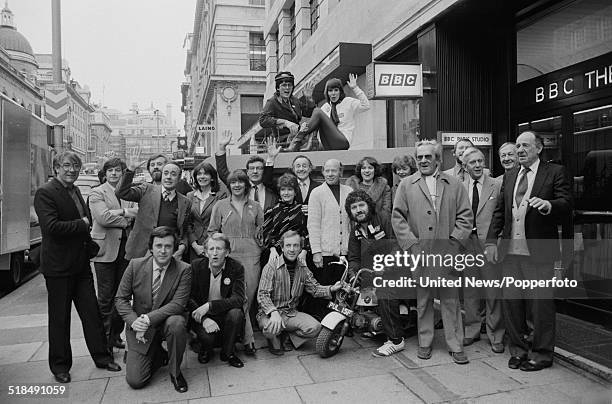 Group shot of BBC radio broadcasters posed together outside the entrance to BBC Paris Studio and Theatre in Lower Regent Street, London on 6th...