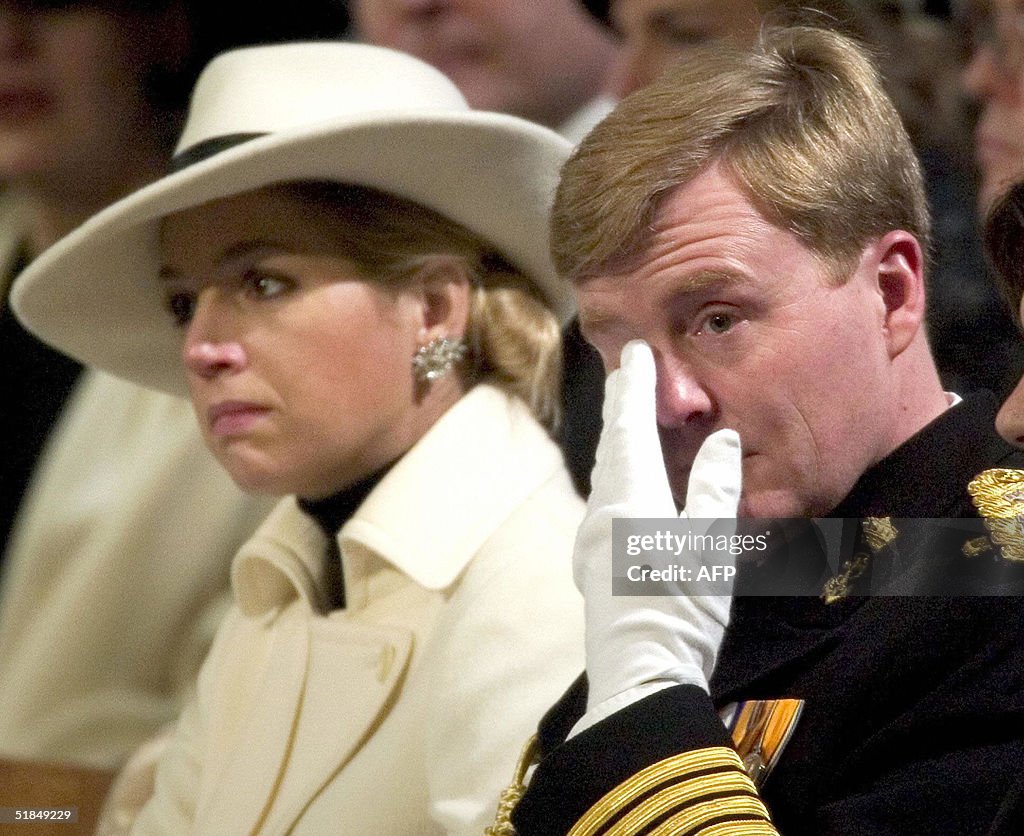 Dutch Prince Willem-Alexander wipes a te