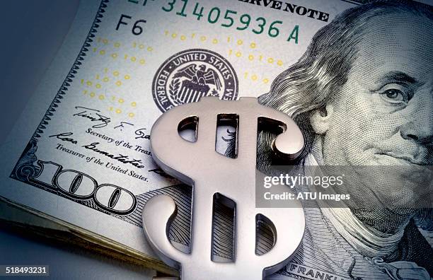 money clip on bills - dollar signs imagens e fotografias de stock