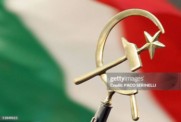 The Communist symbol is carried in front of the Italian flag as Italian leader of the opposition and former president of the EU Commission, Romano...