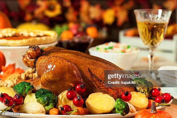 thanksgiving dinner - roast chicken table stock pictures, royalty-free photos & images