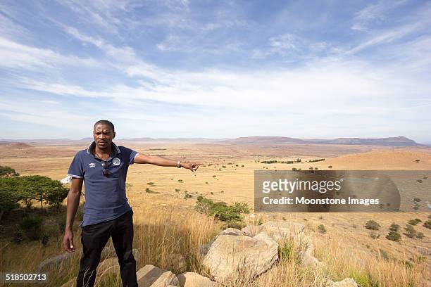 tour guide in isandlwana, south africa - isandlwana stock pictures, royalty-free photos & images