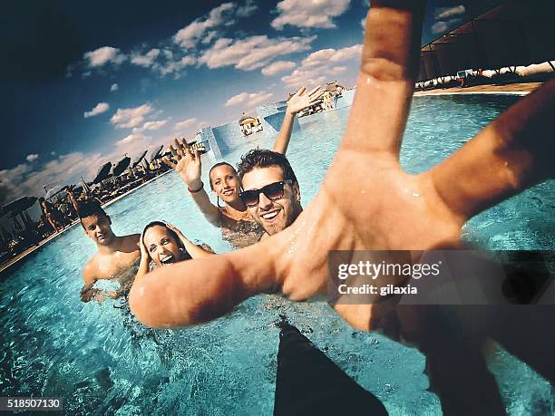 swimming pool selfie. - hand wide angle stock pictures, royalty-free photos & images