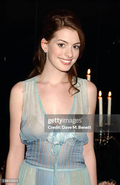 Actress Anne Hathaway attends the 'Ella Enchanted' movie afterparty at the Rouge club on December 11, 2004 in London.