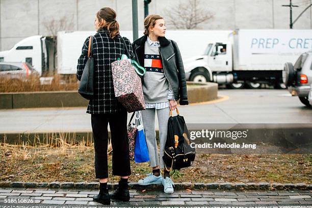 Dutch model Vera Van Erp wears a black leather jacket a gray Tommy Hilfiger logo sweatshirt, gray cropped trousers, a custom black Burberry backpack,...