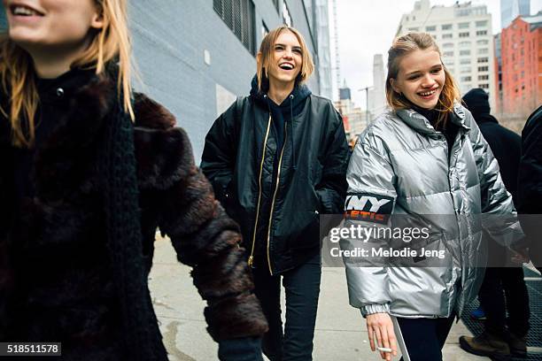 Models Kiki Willems, Molly Bair, and Stella Lucia exit the Michael Kors show at Spring Studios during New York Fashion Week: Women's Fall/Winter 2016...