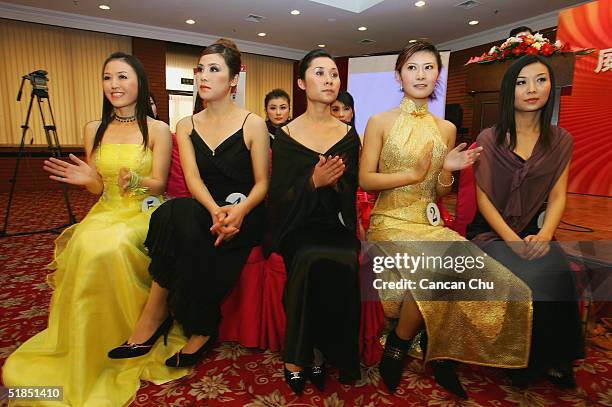 Contestants attend a news conference promoting the first Miss Plastic Surgery on December 12, 2004 in Beijing, China. 19 contestants ranging from 17...