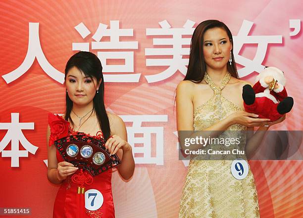 Contestants attend a news conference promoting the first Miss Plastic Surgery on December 12, 2004 in Beijing, China. 19 contestants ranging from 17...