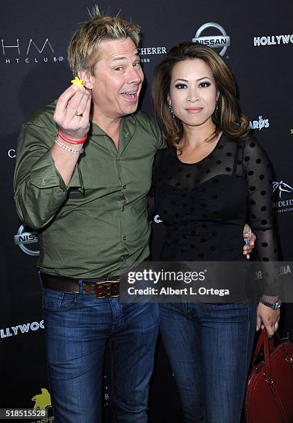 Personality Kato Kaelin and newscaster Leyna Nguyen arrive for the Hollywood Cares Second Annual Poker Tournament To Benefit Stand Up For Gus And The...