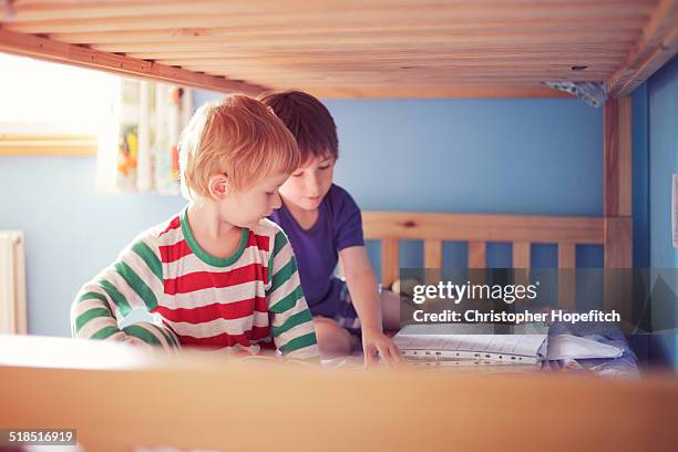 young brothers - bunkbed stock pictures, royalty-free photos & images