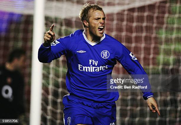 Eidur Gudgjohnsen of Chelsea celebrates scoring their second goal during the Barclays Premiership match between Arsenal and Chelsea at Highbury on...