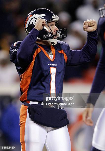 Kicker Jason Elam of the Denver Broncos celebrates after kicking the winning field goal against the Miami Dolphins late in the fourth quarter on...