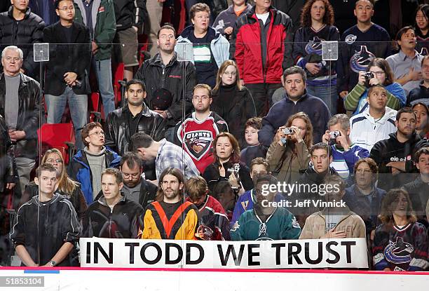 Fans stand behind a banner supporting Todd Bertuzzi of the Vancouver Canucks during the Brad May and Friends Hockey Challenge at the Pacific Coliseum...