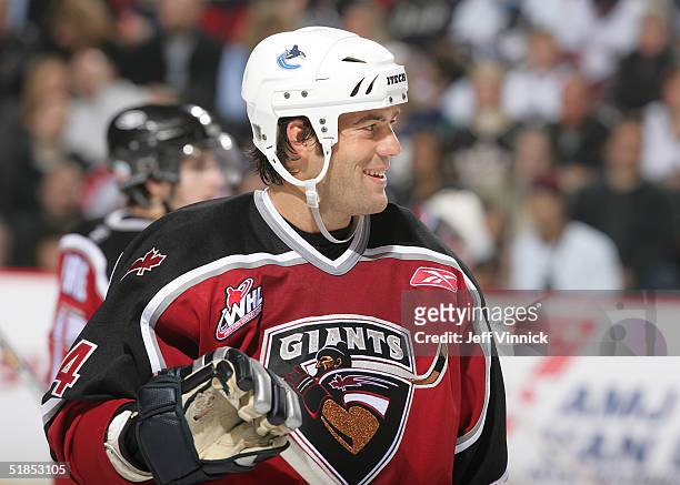 Todd Bertuzzi of the Vancouver Canucks smiles on the ice during the Brad May and Friends Hockey Challenge at the Pacific Coliseum on December 12,...