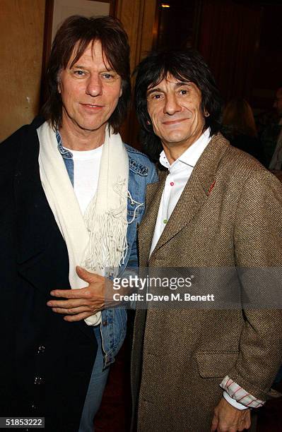 Jeff Beck and musician Ronnie Wood attend Wood's High Tea - Private View in the Theatre Royal on Drury Lane December 12, 2004 in London, England.