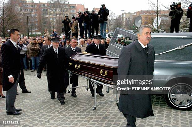 The coffin of Belgian soccer coach Raymond Goethals is carried into the Koekelberg Basilica in Brussels during for his funeral 13 December 2004....