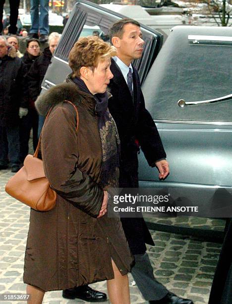 Guy, the son of late Belgian soccer coach Raymond Goethals, and the wife of the deceased follow his coffin into the Koekelberg Basilica in Brussels...