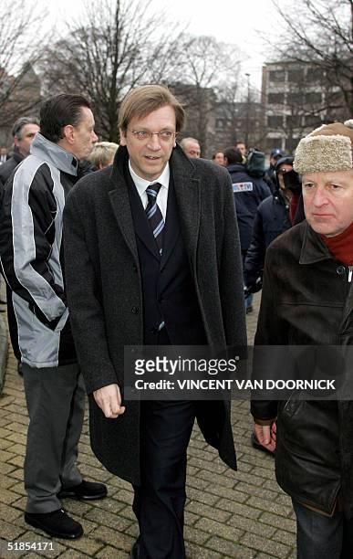 Belgian Prime Minister Guy Verhofstadt arrives at the Basilique of Koekelberg, in Brussels, for the funeral service of late football coach Raymond...