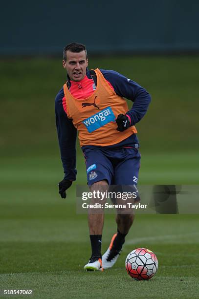 Steven Taylor passes the ball during the Newcastle United Training session at The Newcastle United Training Centre on April 1 in Newcastle upon Tyne,...