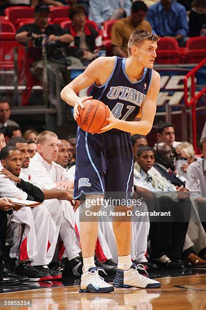 Andrei Kirilenko of the Utah Jazz holds the ball during the game against the Miami Heat at American Airlines Arena on November 19, 2004 in Miami,...