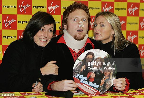 Avid Merrion , presenter Davina McCall and actress Patsy Kensit sign copies of their new Christmas single - a cover of Sonny & Cher's "I've Got You...