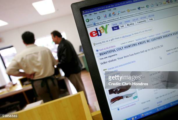 An eBay auction is seen on a computer in a branch of iSold It, an eBay drop off store December 13, 2004 in Huntington, New York. ISold It, a...