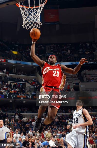 LeBron James of the Cleveland Cavaliers dunks the ball during a game against the Memphis Grizzlies on December 13, 2004 at FedexForum in Memphis,...