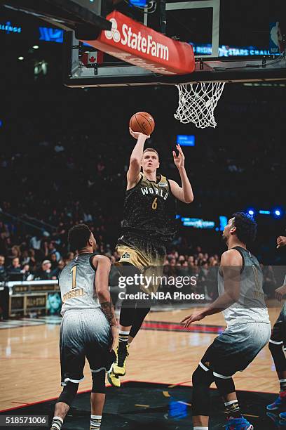 Kristaps Porzingis of Team World drives to the basket during the BBVA Compass Rising Stars Challenge as part of 2016 All-Star Weekend at the Ricoh...