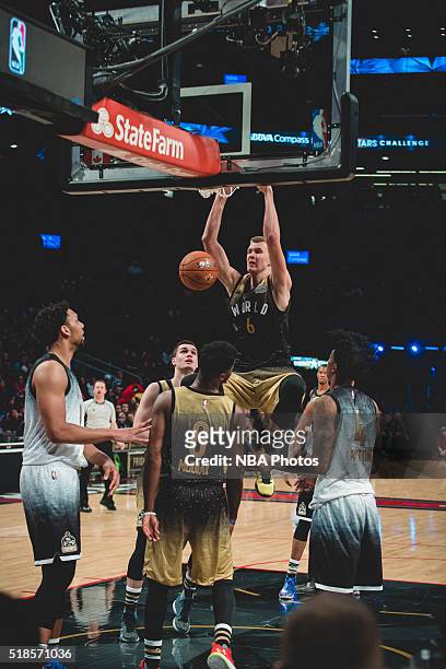 Kristaps Porzingis of Team World dunks the ball during the BBVA Compass Rising Stars Challenge as part of 2016 All-Star Weekend at the Ricoh Coliseum...