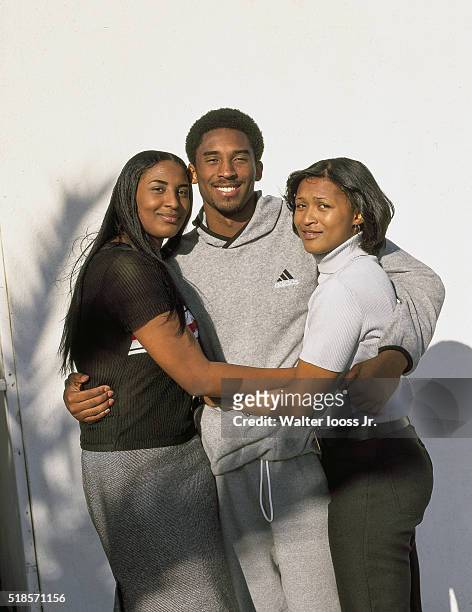 Casual portrait of Los Angeles Lakers Kobe Bryant posing with his sisters Shaya and Sharia during photo shoot. Los Angeles, CA 4/27/1998 CREDIT:...