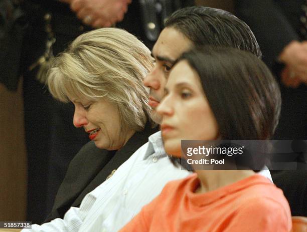 Sharon Rocha, Brent Rocha and his wife, Rose Marie Rocha, sit during a news conference after the jury verdict sentence recommendation of death for...