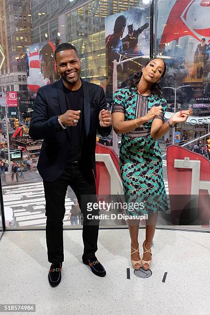 Calloway interviews Kelly Rowland during her visit to "Extra" at their New York studios at H&M in Times Square on April 1, 2016 in New York City.