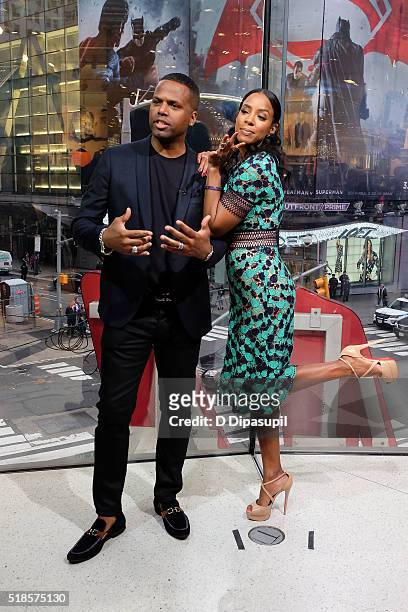 Calloway interviews Kelly Rowland during her visit to "Extra" at their New York studios at H&M in Times Square on April 1, 2016 in New York City.