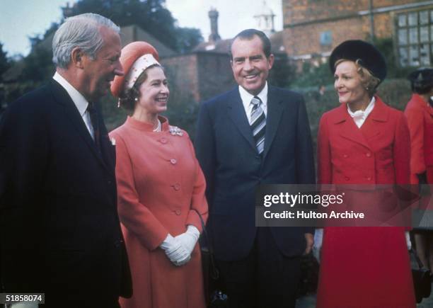 Queen Elizabeth II with British Prime Minister Edward Heath and U.S President Richard Nixon and his wife Patricia at Chequers, Heath's official...