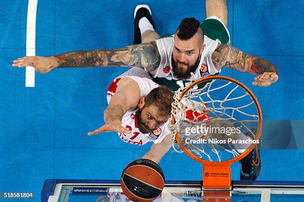 Luka Zoric, #21 of Cedevita Zagreb competes with Miroslav Raduljica, #10 of Panathinaikos Athens during the 2015-2016 Turkish Airlines Euroleague...