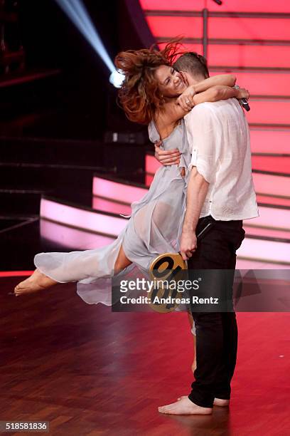 Eric Stehfest and Oana Nechiti react after their performance on stage during the 3rd show of the television competition 'Let's Dance' on April 1,...