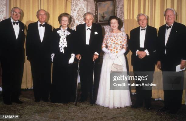Former British Prime Ministers James Callaghan, Sir Alec Douglas-Home , Harold MacMillan , Harold Wilson and Edward Heath with Queen Elizabeth II and...