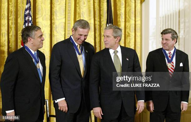President George W. Bush poses with the Presidential Medal of Freedom awardees former CIA chief George Tenet , retired US Army General Tommy Franks ,...