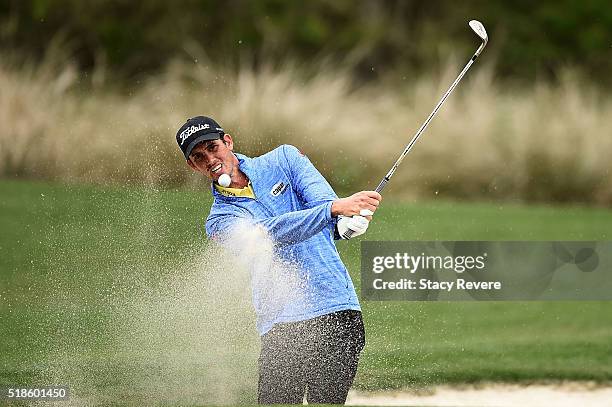 Chesson Hadley of the United States hits from a green side bunker on the fifth hole during the second round of the Shell Houston Open at the Golf...